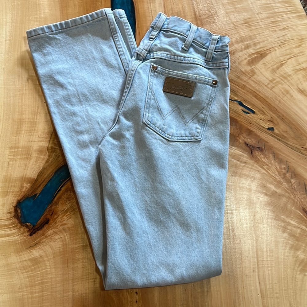 Light wash cowboy cut wranglers